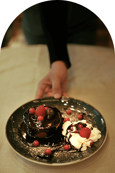 Wine pouring over a dinner table